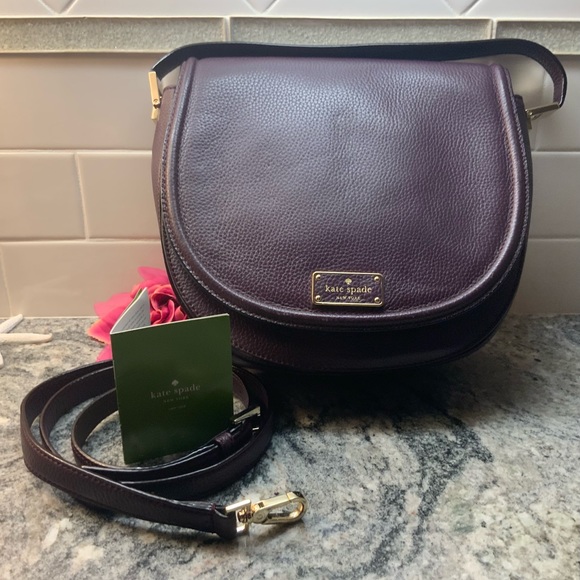 kate spade Handbags - Large Kate Spade saddle bag in wine/burgundy color. Handle& crossbody.